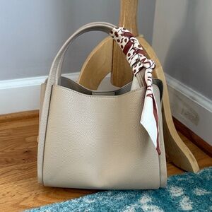 Elegant Cream Handbag with Scarf Accent